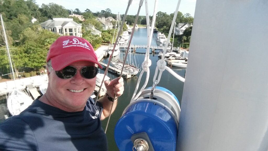 Me at the top of the mast using the Swi-Tek Mast Lift which allows easily climbing the mast solo